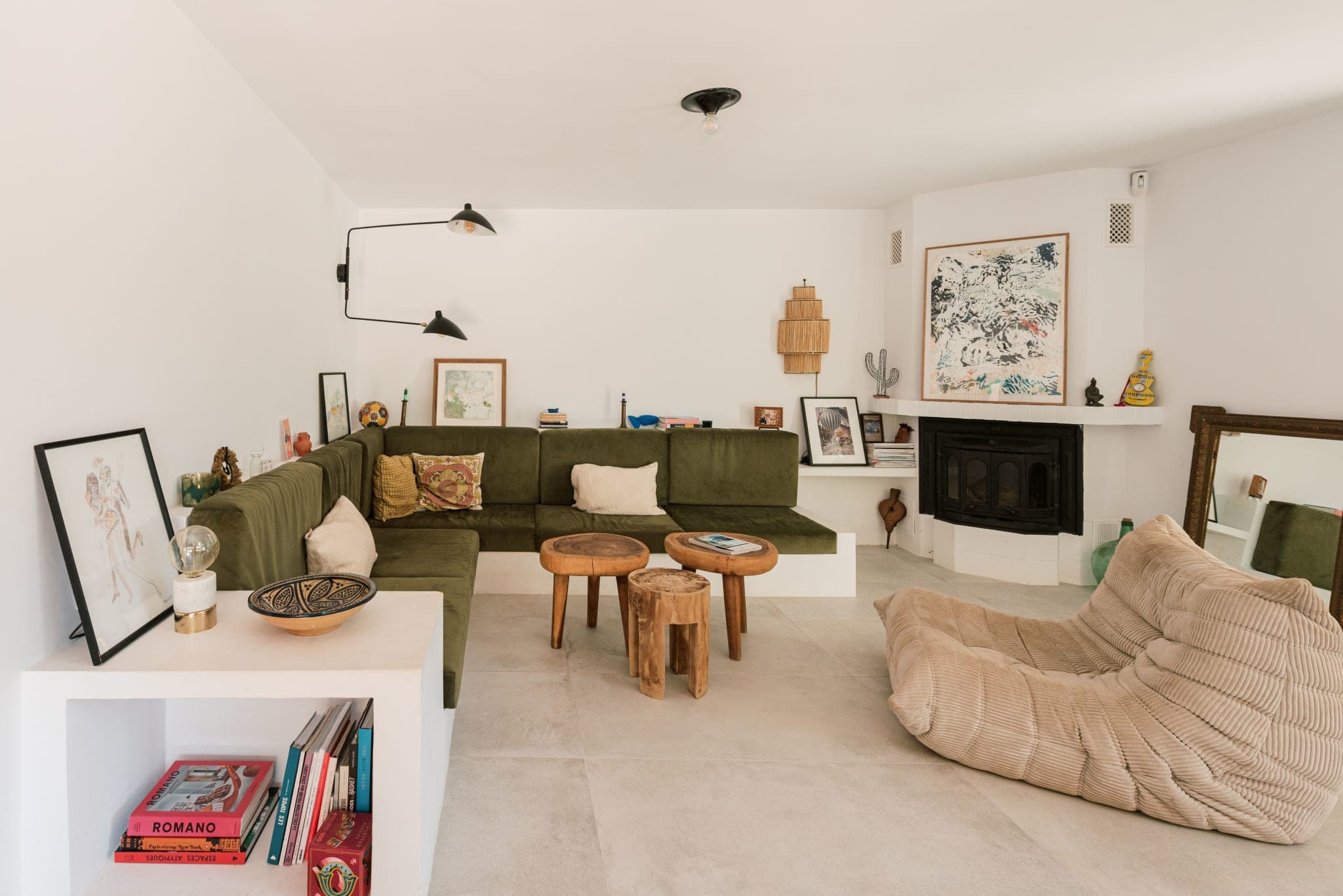 Living room with green velvet sofa