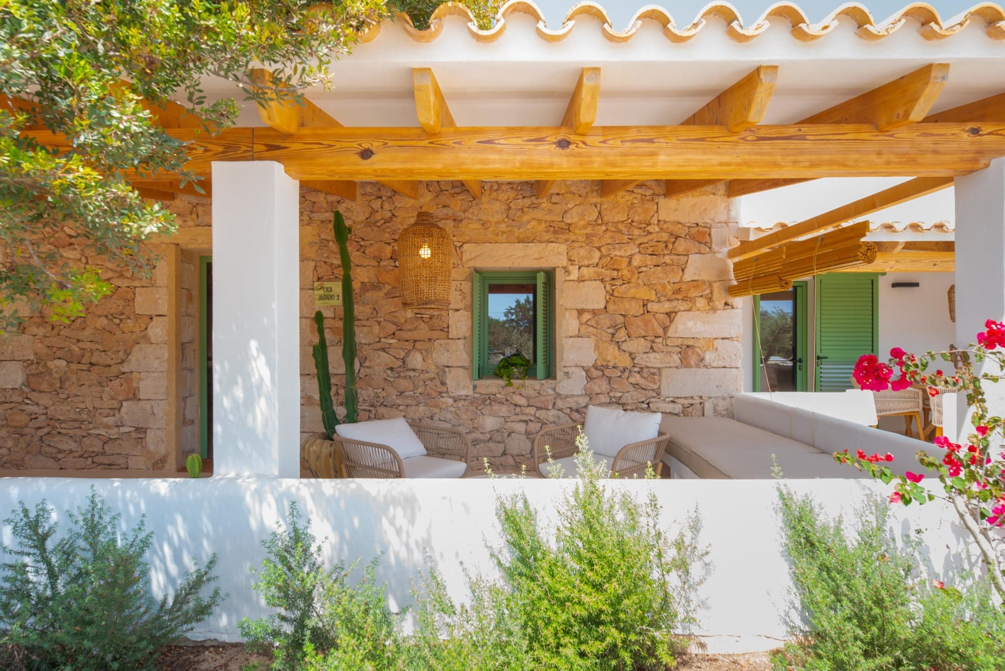 Wood pergola terrace among olive trees