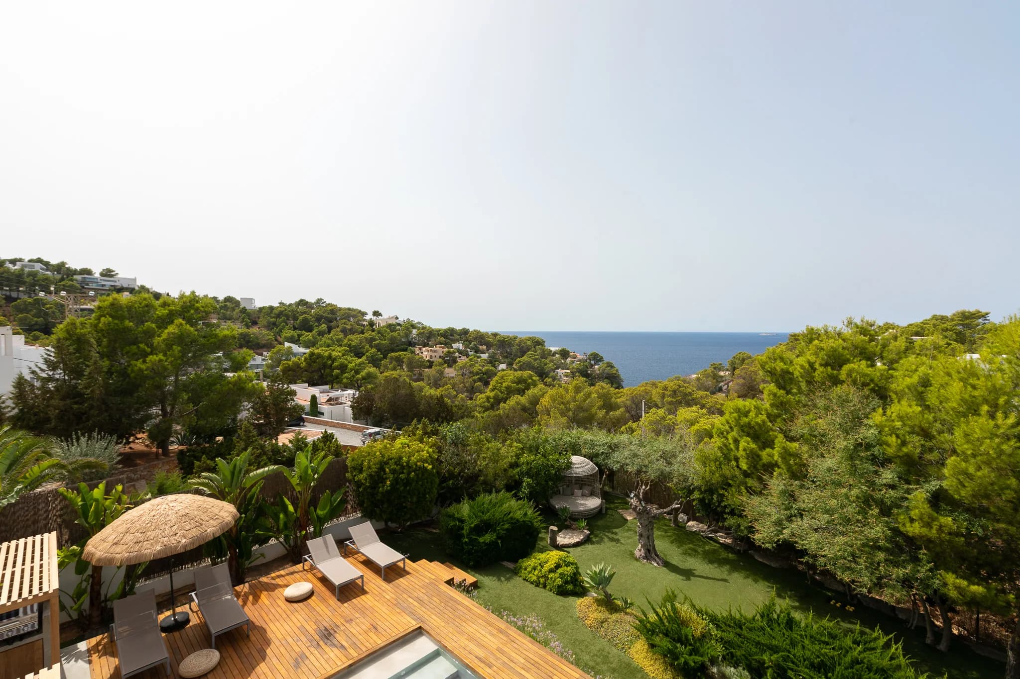 Garden and pool from above, toward the sea