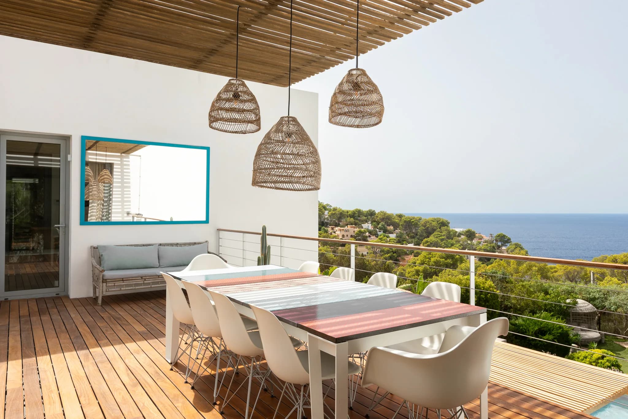 Rooftop dining terrace with sea view